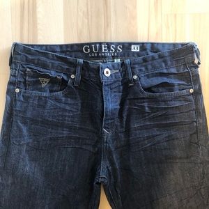 Dark wash guess jeans.
